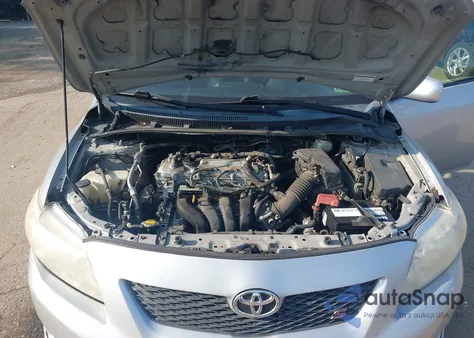 2009 Toyota Corolla S from USA, damaged, VIN 1NXBU40EX9Z024565